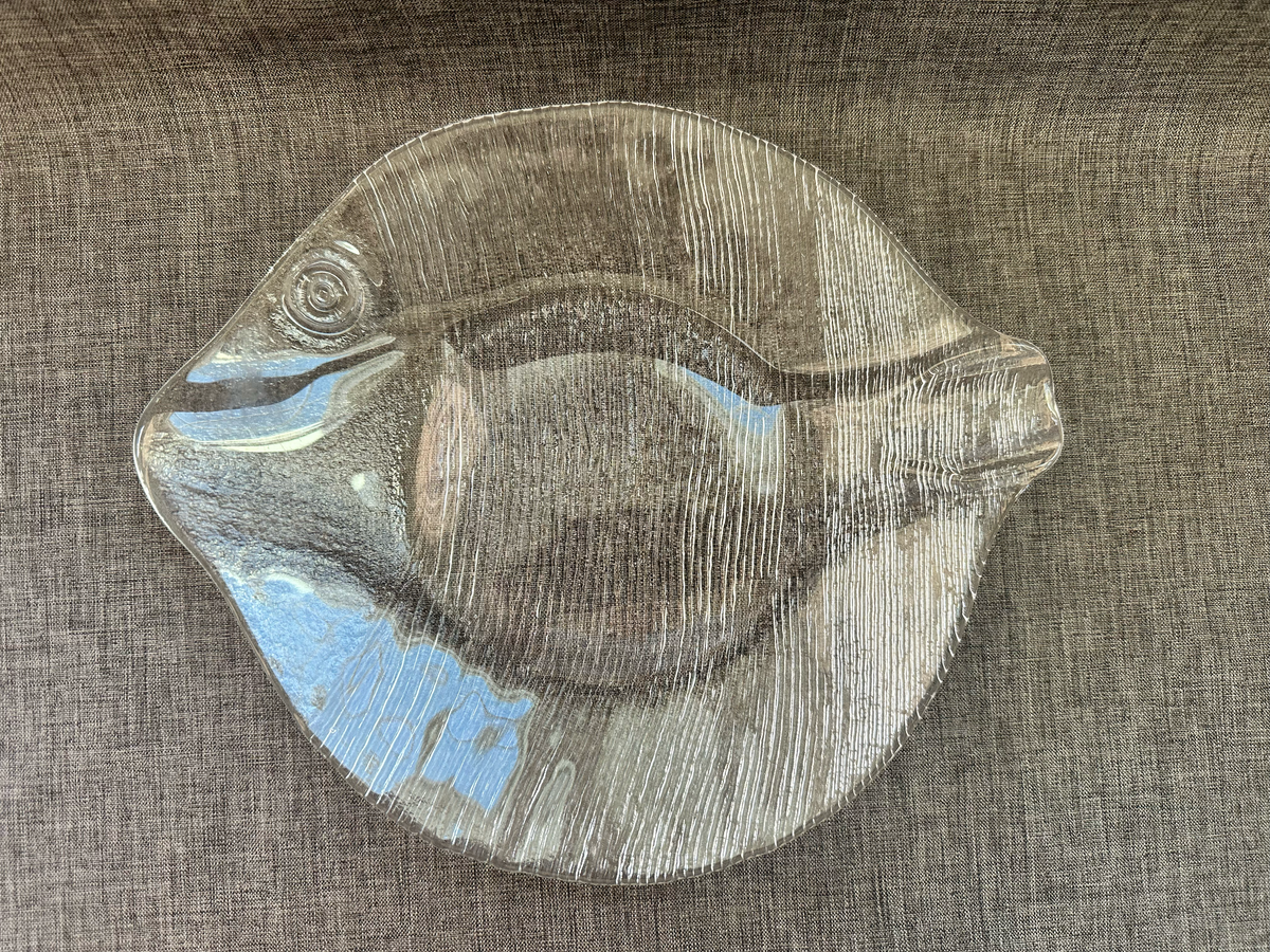 Vintage clear glass fish serving plate, approximately 9 by 10 inches, shown in full.
