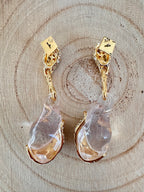 Back view of Alexis Bittar Liquid Lucite drop earrings showing gold-tone posts, hardware, and AB hallmarks.
