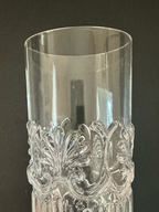 Detail photo showing light scratch on body of glass