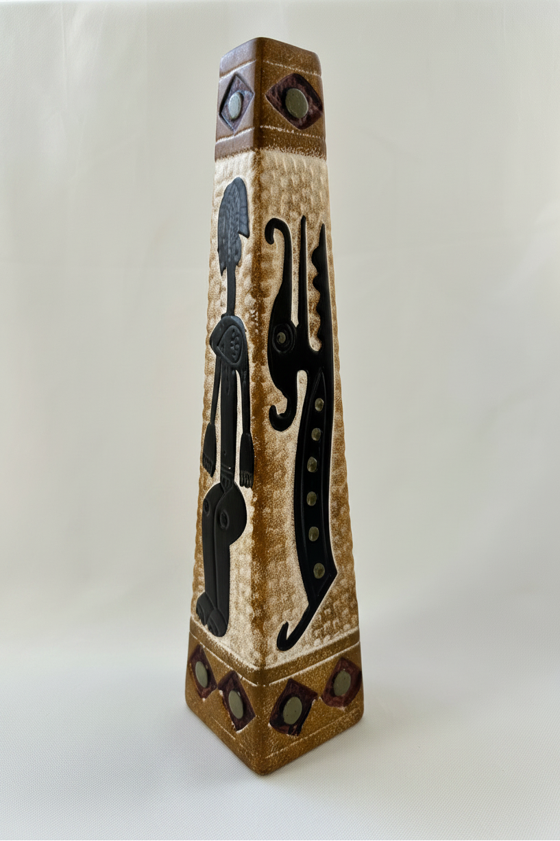 Three-quarter view of 13-inch ceramic vase with black raised motifs and earthy painted accents.
