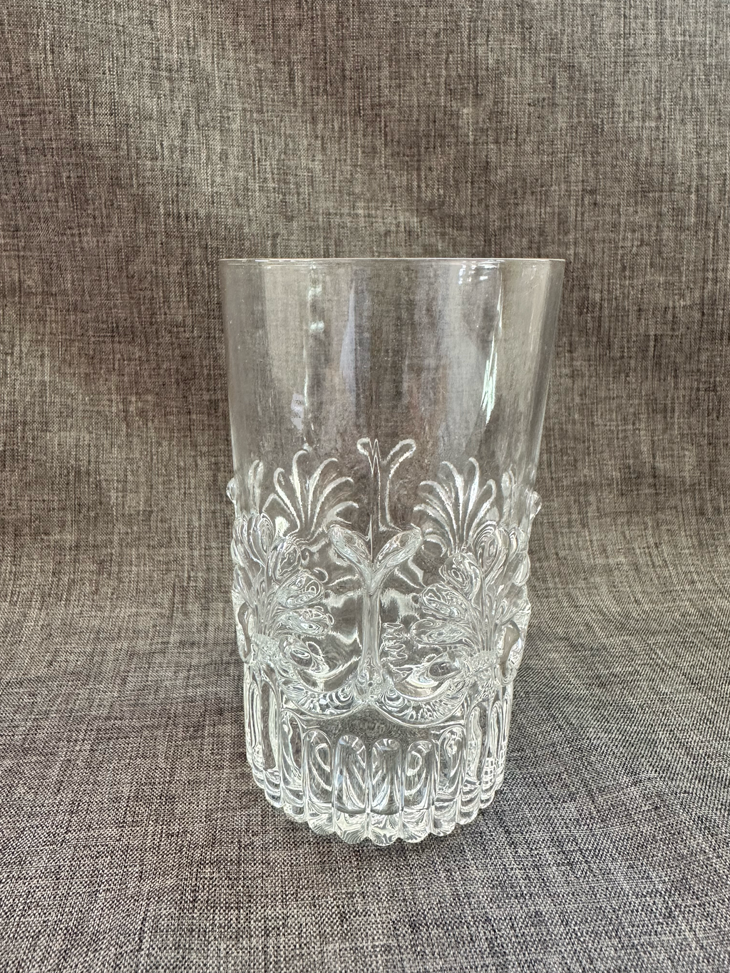 Single MMA glass showing details of design in a linen gray studio environment. 