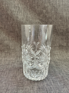 Single MMA glass showing details of design in a linen gray studio environment. 