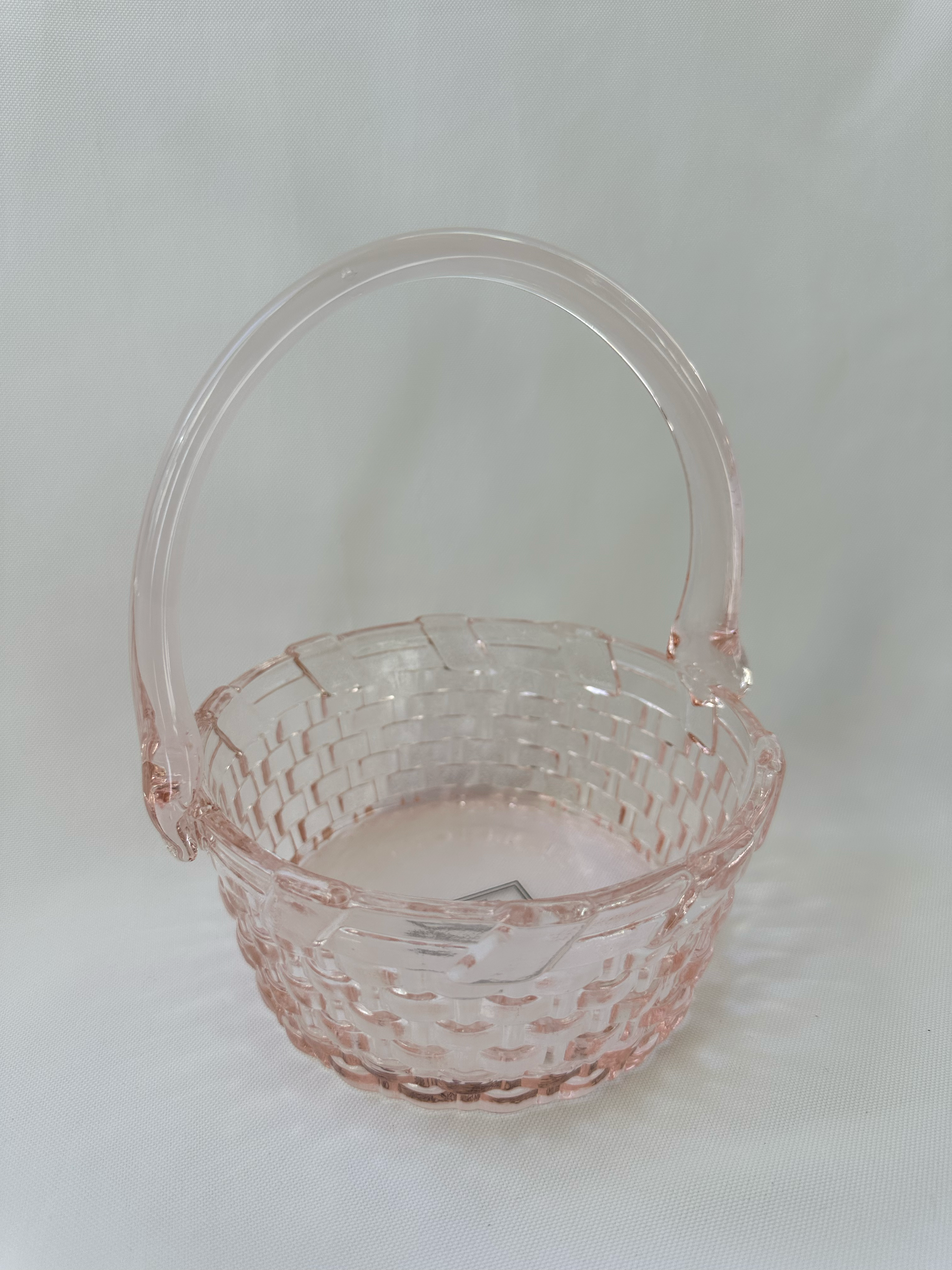alt view of pink glass Williams Sonoma basket
